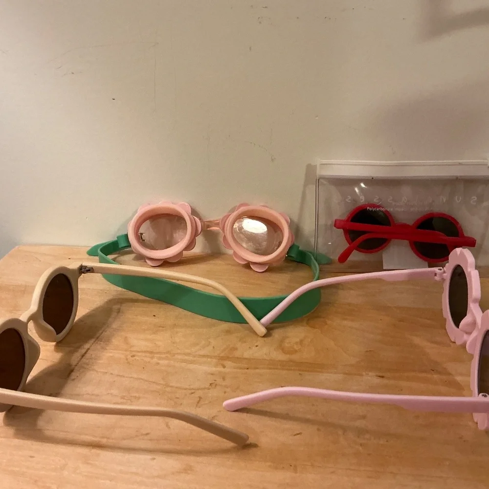 Collection of sunglasses (Baby Gap and others)and swim goggles Stephen Joseph